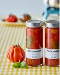 Geschälte Tomaten im Glas